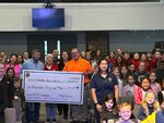 This morning at the Okeechobee Christian Academy, Sheriff Noel Stephen was joined by Mr. Greg Maynard and Ms. Timmie Oldiges from Wreaths Across America Okeechobee, who accepted a fantastic donation of $1050.00 from Principal Melissa King and the children and teachers who made this donation possible.
During their kindness week, money to “dress down” from their regular uniforms and wear red, white, and blue or camouflage was collected. Needless to say, these kids went above and beyond any expectations.
Please come out next Saturday, December 16, to the Evergreen cemetery, where the service will start at noon. You can assist us in laying wreaths out on all veterans grave markers who are laid to rest at the cemetery.
After completing Evergreen, predetermined groups will go to Bassinger and Ft. Drum to ensure those veterans laid to rest there are honored. 
We hope to see you then.